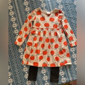 Hanna Andersson fall outfit cute girls pumpkin mini dress with black leggings